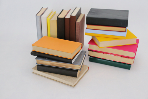 Stack,Of,Books,On,White,Background